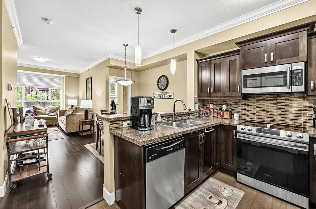 411 13897 FRASER HIGHWAY, Surrey, BC — Residential for Sale - Photo 2