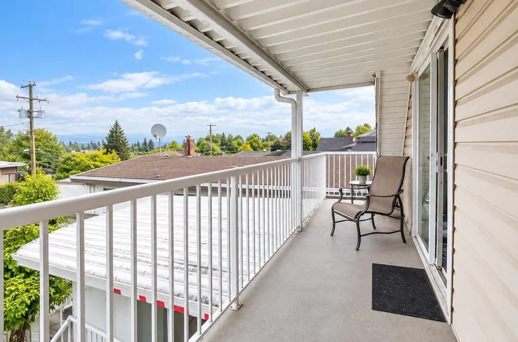 Top 4265 SLOCAN STREET, Vancouver BC V5R 1Z2 - Photo 1